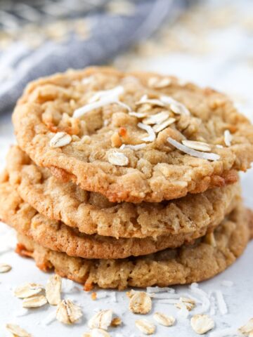 A stack of cookies made with oatmeal and coconut.