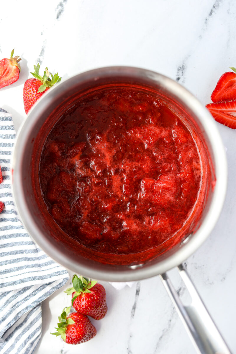 A saucepan filled with fruit spread.