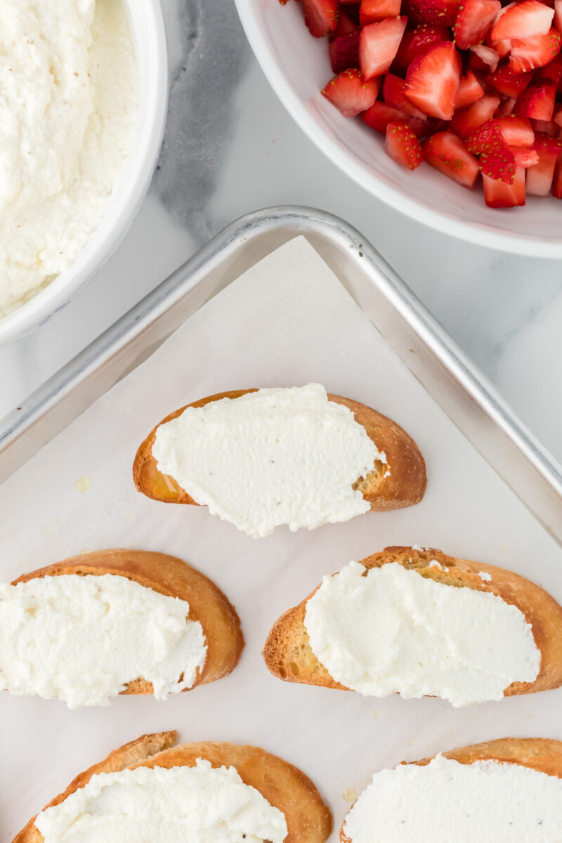 Baguette slices topped with a ricotta mixture.