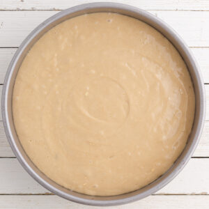A cake pan filled with cake batter.