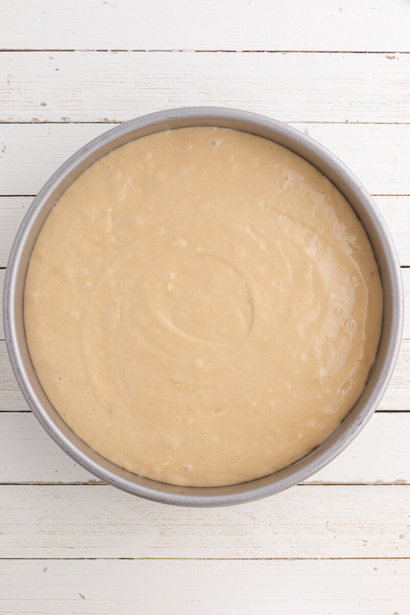 A cake pan filled with cake batter.